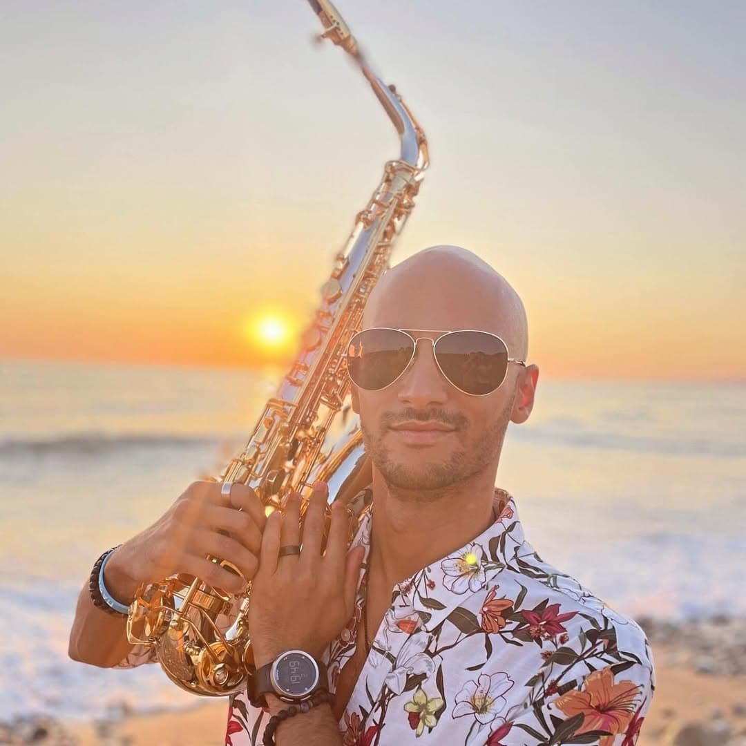 Victor Jazz sunset portrait — cocktail hour saxophonist Paphos Cyprus